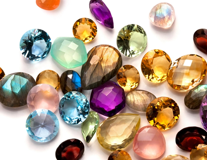 What is the difference between precious and semi-precious gemstones?
